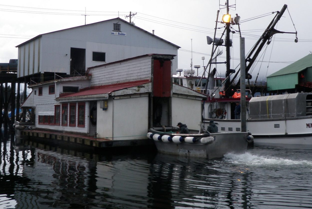 99 year-old shop floated to new location