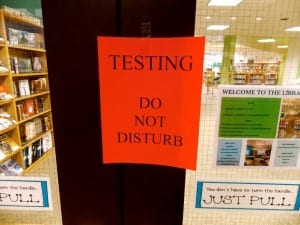 This sign was posted on the high school library doors during testing last week. Photo/Angela Denning