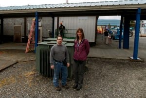 Dan Tate and Erica Kludt-Painter stand in front of the Rae C. Stedman Elementary School where construction is ongoing. Photo/Angela Denning