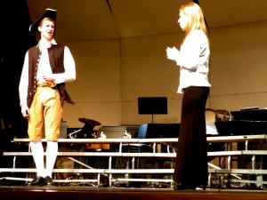 Ben Higgins and Stephanie Pfundt perform, "O, False One!" in their command duet from the 2014 music festival. Photo/Angela Denning