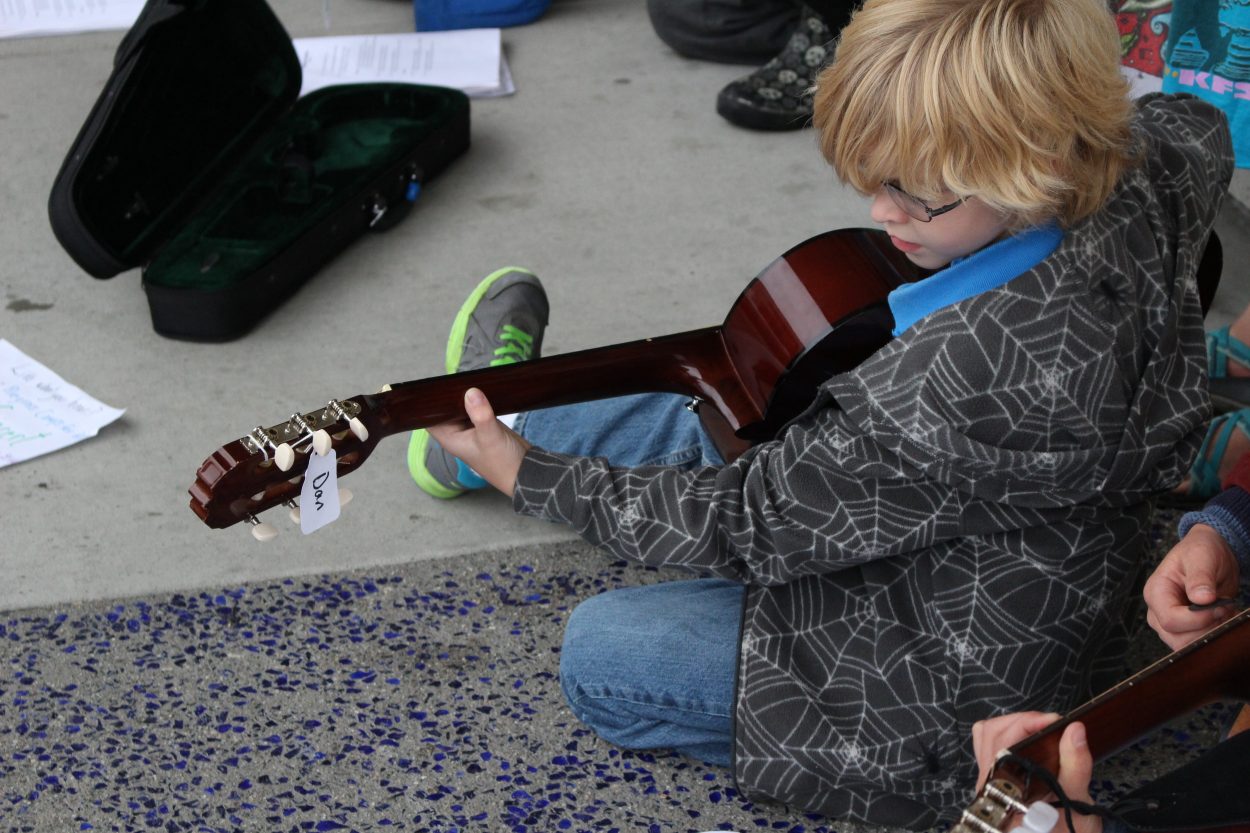 Bluegrass Camp for Kids goes busking