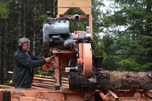 Chris Fry milling a spruce log 