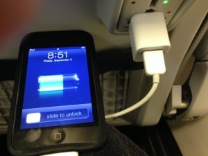 The new Alaska Alaska Airlines Recaro seats include plug-ins for phone, tablets and similar devices. (Ed Schoenfeld, CoastAlaska)