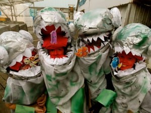 11-year-old girls Lydia Martin,  Jaden Perry, Mandy Hayes, and Lisa Murph painted their faces red as part of their "Barracuda" costumes. Photo/Angela Denning