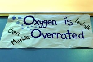 This poster hangs in the high school supporting swimmers as they prepare to host the Regions swim meet this weekend. Photo/Angela Denning