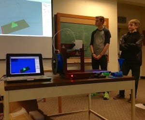 Tucker Hagerman and AJ Erickson give a presentation on the 3-D printer to the Petersburg School District Board. Photo/Angela Denning