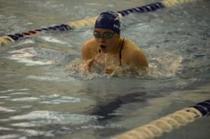 Mariah Taylor competes in the 100 yard breaststroke, taking 9th place. Photo/Doug Fleming