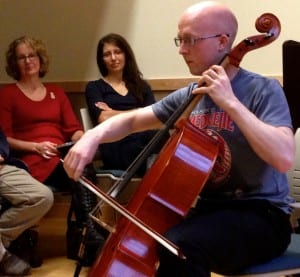 Jonathan Kreiss-Tomkins plays the cello in the 2014 Holiday Literary hosted at the Petersburg Public Library.