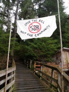 Residents of Port Protection and Point Baker on Northern Prince of Wales posted their opposition to the land transfer bill on the boardwalk into Port Protection in 2010. (KFSK file photo)