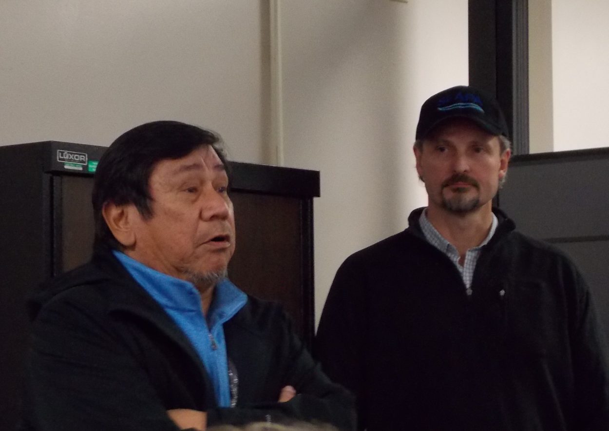 Kake mayor Henrich Kadake pleads for a connection to cheaper hydro-electricity as Southeast Alaska Power Agency CEO Trey Acteson listens.