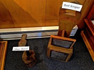 A shoe anvil and boot scraper are on display at the museum. Photo/Angela Denning