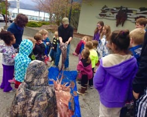 Commercial fisherman, Andy Worhatch, holds a Giant Grenadier for students to see. Photo/Angela Denning