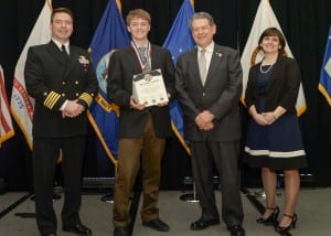 Ian Fleming receives his first place award for the environmental science category. Photo courtesy of Doug Fleming