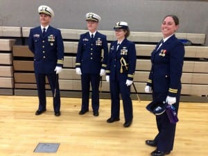 Before the ceremony, Lt. Peter Vermeer (second from left) and Lt. Kathryn Cyr (third from left) stand with other officers. Photo/Angela Denning