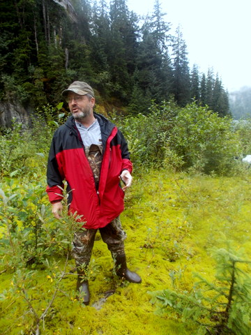 Mort McMillen, Chief Engineer for the new hydroelectric plant surveys the scene at Scenery Lake.(Joe Sykes)