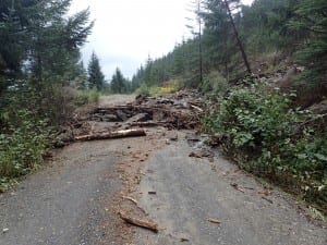 Rocks spilled across Dry Straits Road preventing vehicle traffic. Photo/Brad Hunter