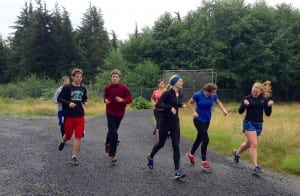 The cross country team practicing this summer.