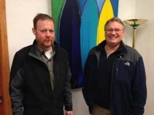 Petersburg Rotary Club President, David Byrne stands with District Governor Brad Gamble at the KFSK studios.