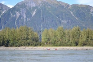 A line of cleared trees marks the U.S.-Canadian border on the Stikine River.