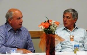 British Columbia Mines Minister Bill Bennett, left, and Alaska Lt. Gov. Byron Mallott talk at a dinner at Juneau's Walter Soboleff Center in August. (Photo courtesy of the governor's office)