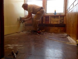 Charlie Christensen works on turning a closet into a pantry upstairs at the Sons of Norway hall. Photo/Angela Denning