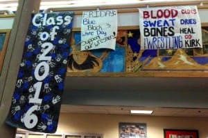 Wrestling support signs hand in the commons at Petersburg High School. Photo/Angela Denning