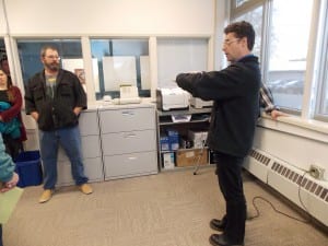 Architect Corey Wall of MRV Architects leads a tour through the municipal building Monday. Under the plans, this borough office space would be turned into new first floor offices for the police department.