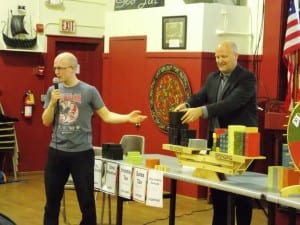 Sitka Democrat Jonathan Kreiss-Tomkins, left, and Ken Alper, director of the state's Tax Division, explain Alaska's budget situation using 100-million-dollar budget blocks.