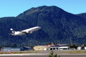 An Alaska Airlines jet takes off from Petersburg's airport in 2014. A Sunday night flight from Seattle to Ketchikan and Juneau was struck by lightning. (Photo by Ed Schoenfeld/CoastAlaska News)