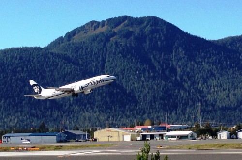 An Alaska Airlines jet takes off from Petersburg's airport in 2014. A Sunday night flight from Seattle to Ketchikan and Juneau was struck by lightning. (Photo by Ed Schoenfeld/CoastAlaska News)