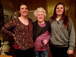 92-year-old Elizabeth Tyner stands at home with granddaughter, Melinda Cook, (left) and great-granddaughter, Shawnee Cook, age 18. Photo/Angela Denning