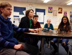 Team "Ocean Motion" considers a question during a quiz bowl practice. (L-R) Chauncy Sandhoffer, Marissa Nilsen, Tucker Hagerman, Helen Martin, Julia Murph. Photo/Angela Denning