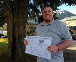 Petersburg Parks and Recreation Director Donnie Hayes holds plans for two trail expansion projects this summer. Photo/Angela Denning