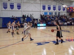 Courtney Fredrickson and the Lady Vikings set up their half court defense against the Lady Panthers Friday.