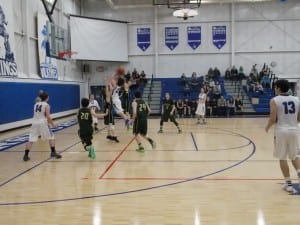 Senior Jordan Lapeyrie drives to the basket against Craig Friday.