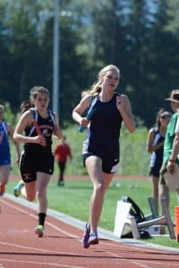 Kayleigh Eddy runs in a relay at the regional meet in Juneau. (Photo courtesy of Brad Taylor, Viking Track and Field)