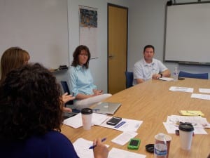 Sandra Stevens center interviews with Jay Lister and other members of the Petersburg school board Friday.