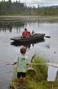 Kids caught dragonflies while community members rowed around Shelter Lake. (photo/Orin Pierson) 