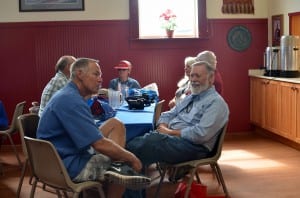 Nordhavn yachters talk shop in the Sons of Norway Hall. Photo/Abbey Collins