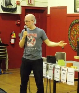 Sitka Democrat Jonathan Kreiss-Tomkins explains Alaska's budget situation during a presentation at the Sons of Norway Hall in Petersburg in January. (KFSK file photo)