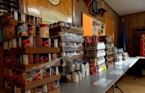 Stacks of canned food are organized and ready to be packed into Thanksgiving boxes at the Salvation Army Church, Nov. 21. Photo/Angela Denning