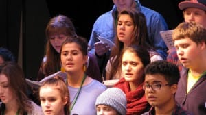 Kelsa Sperl, Julia Murph, and Jasmine Ieremia sing with other honors choir students. Photo courtesy of Matt Lenhard