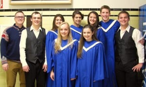 Music teacher Matt Lenhard poses with the eight students who went to the All-State Music Festival: (L-R) Matt Lenhard, Senior Nathaniel Lenhard, Junior Jasmine Ieremia, Sophomore Eva Lenhard, Senior Kelsa Sperl, Freshman Brooklyn Dormer, Junior Julia Murph, Senior Ben Higgins, Junior Brandon Ware. Photo courtesy of Matt Lenhard