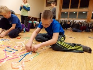 11-year-old Wyatt Litster constructs a maze at the library's Curiosity Creates program. Photo/Angela Denning