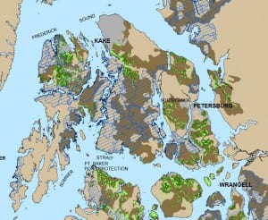 Timber production suitable lands are in green, dark green for old growth and light green for young growth, while conservation areas are shaded in blue.