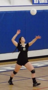 Elisa Larson serves during a home match November 18 (KFSK file photo)