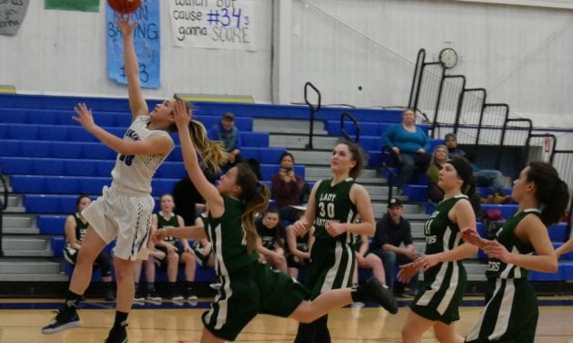 PHS girls basketball breaks into win column, boys win two on the road