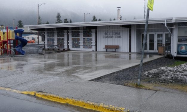 School board approves status quo budget with state funding in question