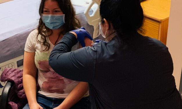 First workers, residents receive vaccine in Petersburg