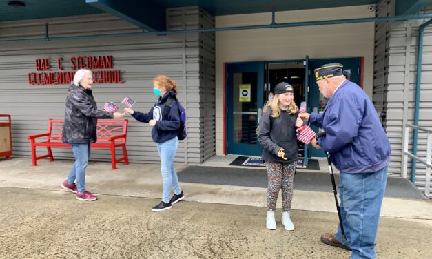 Flags were given to Petersburg students to encourage conversations about 9/11